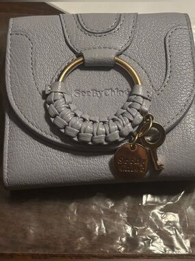 See By Chloe Dusty Blue Braided-Ring Leather Trifold Waller with Gold Charm